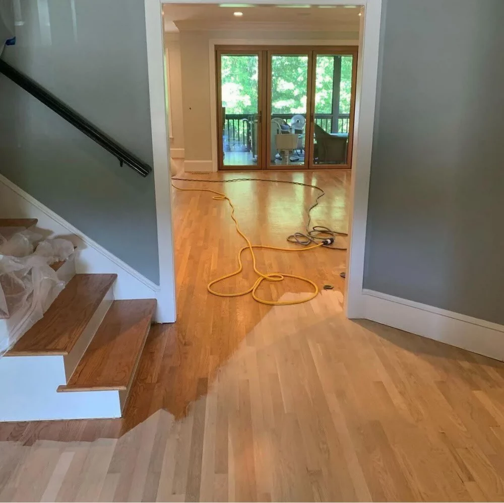 Hardwood finish application process in a house