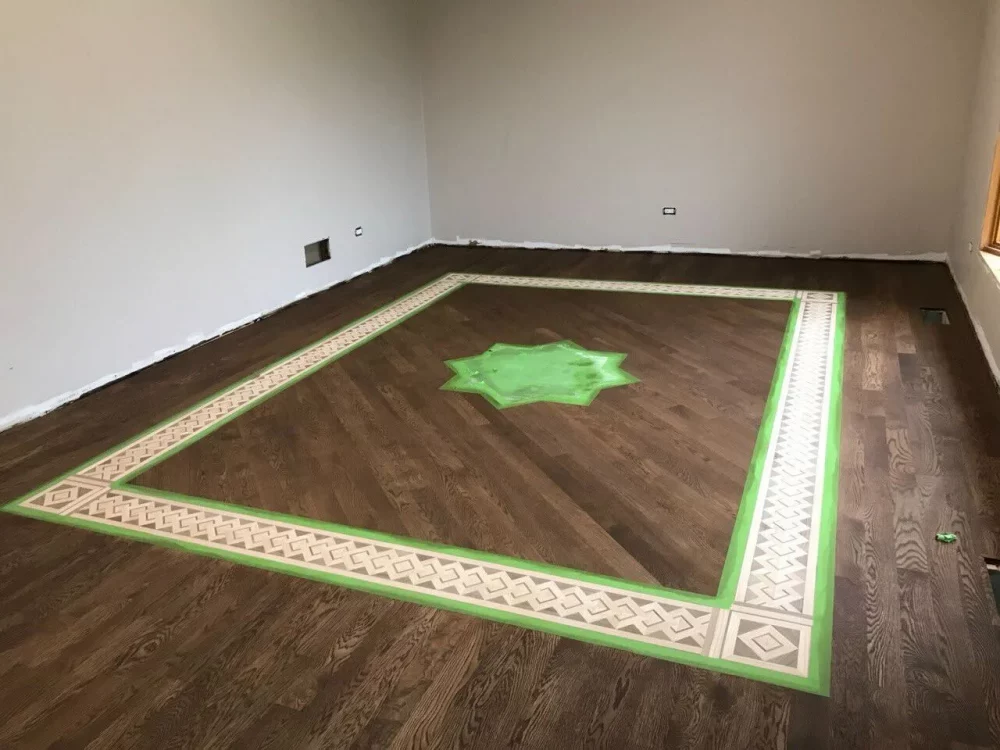 Stained hardwood floor ready for finish application