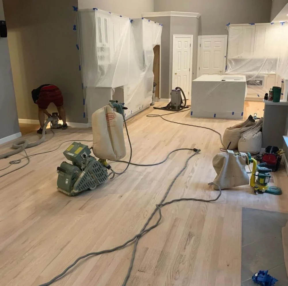 Hardwood sanding process with all furniture covered