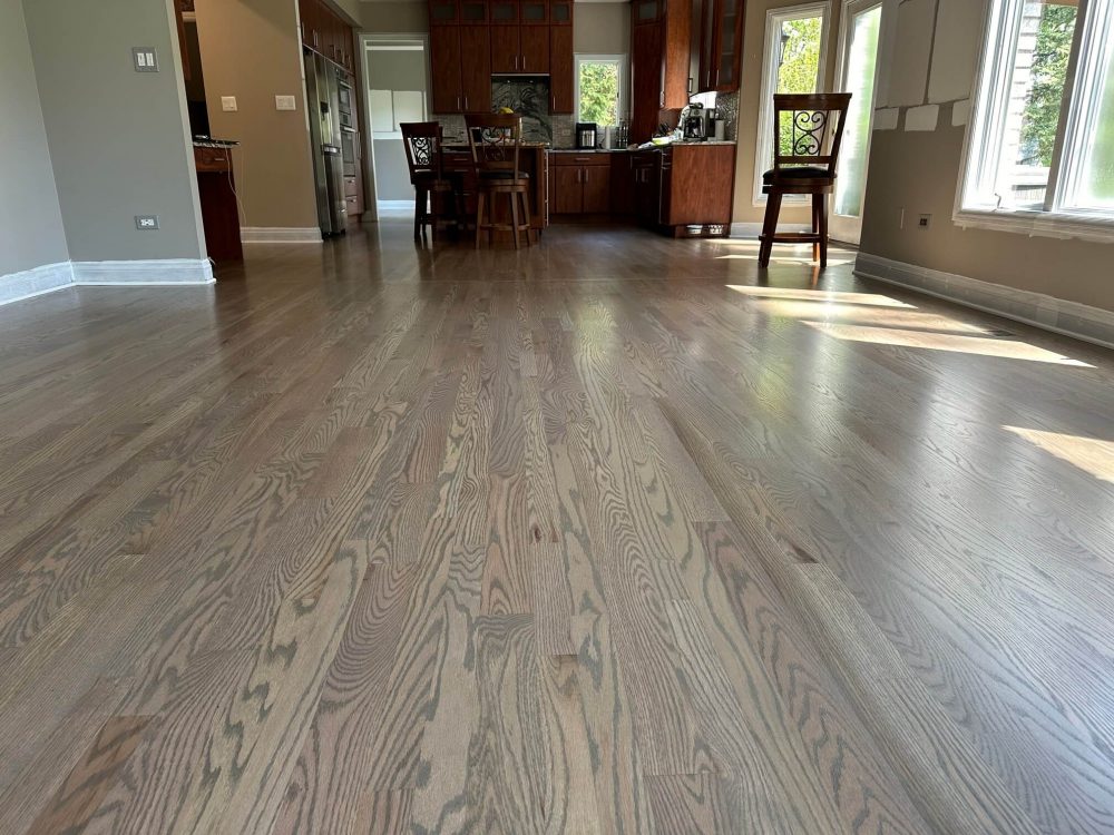 Fully refinished hardwood floors in the kitchen