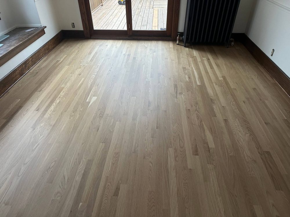 Refinished oak floors after our work