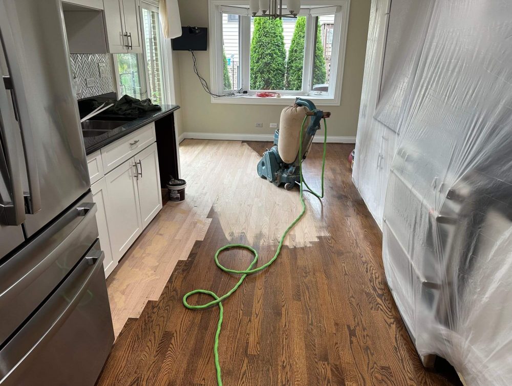 Hardwood floor sanding process in Darien