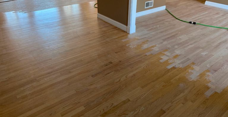 Hardwood floor repair in process