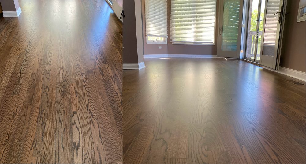Open living room with provincial-stained hardwood floor and zooming floor on the left, which shows a premium finish choice that can raise material costs