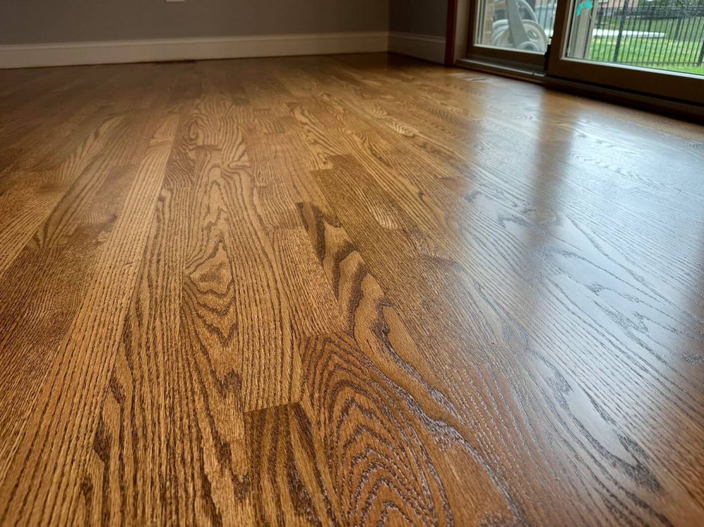 After photo of restored oak floors in Lemont with warmer color and a clean satin sheen