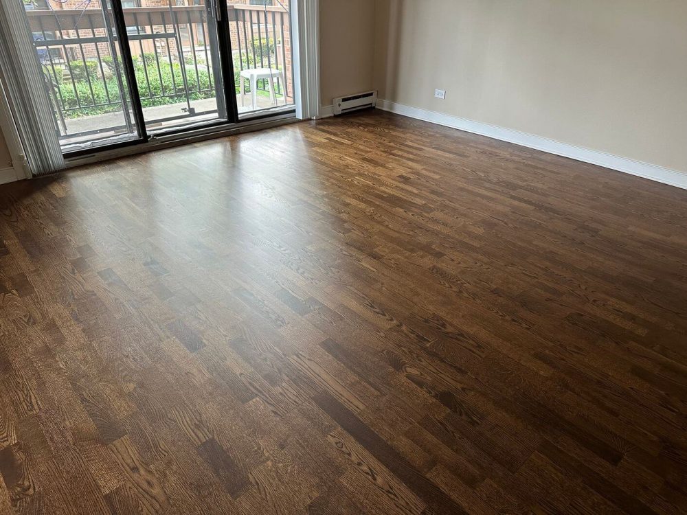 The completed floor after our refinishing work gave this Burr Ridge condo a richer color and a more finished overall look.