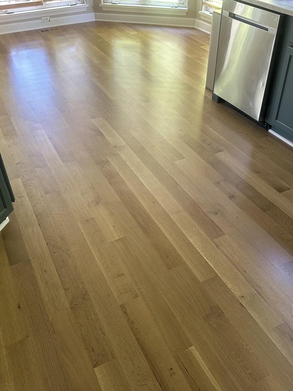 Natural stained hardwood floor in an Aurora living room