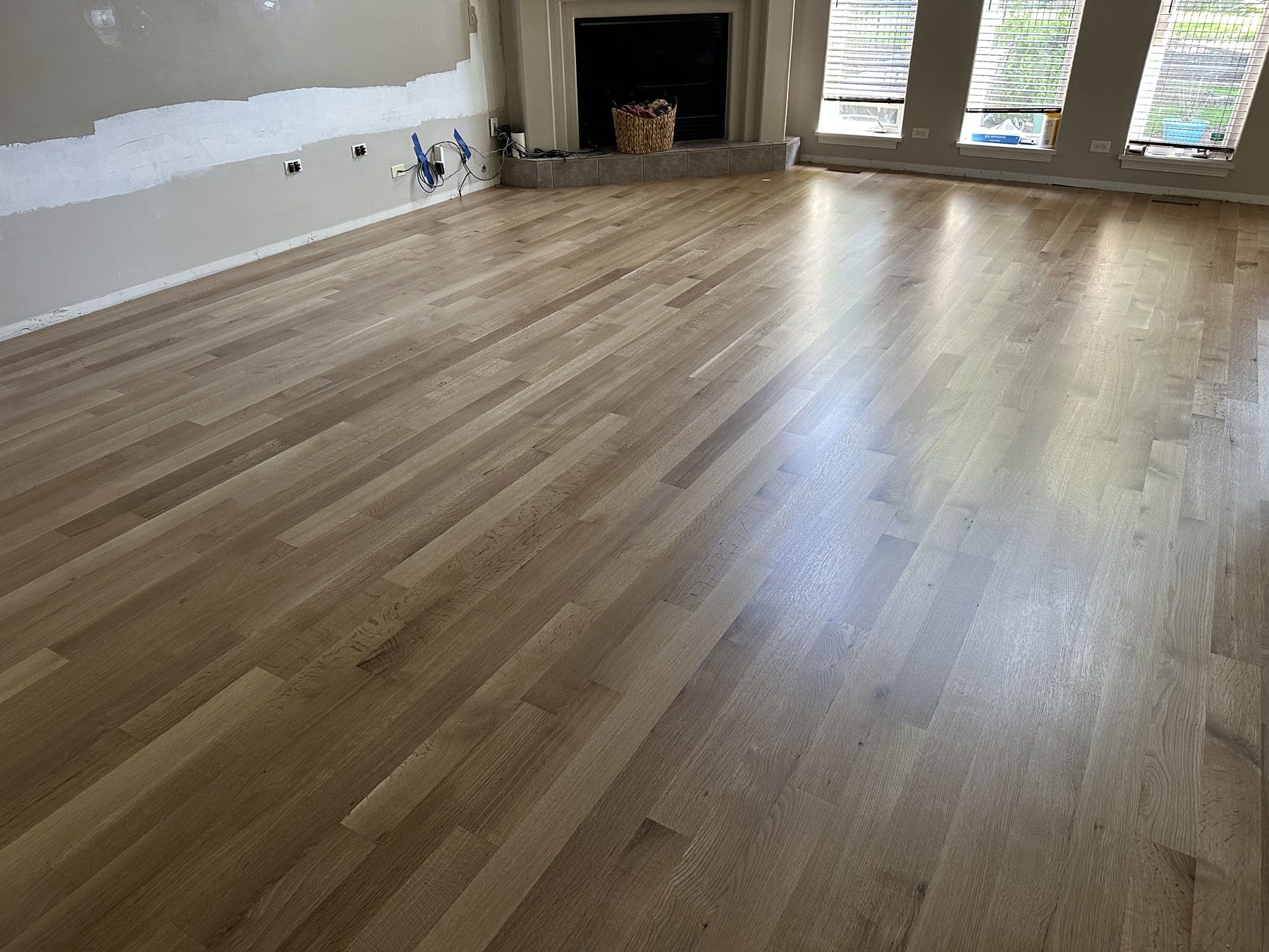 Finished natural rift and quarter sawn white oak floor in the great room, Aurora, IL