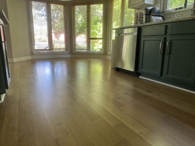 Rift-sawn white oak floor in the kitchen with dark cabinets, Aurora, IL