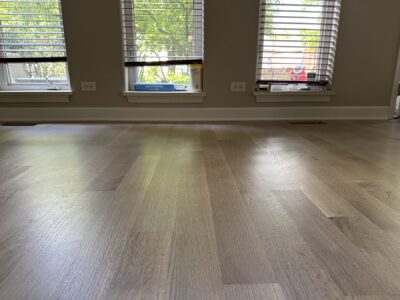 Finished rift-sawn white oak floor in the living room by the windows, Aurora, IL