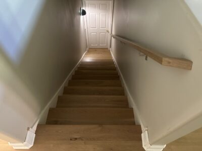 Rift and quarter sawn white oak staircase with handrail, Aurora, IL
