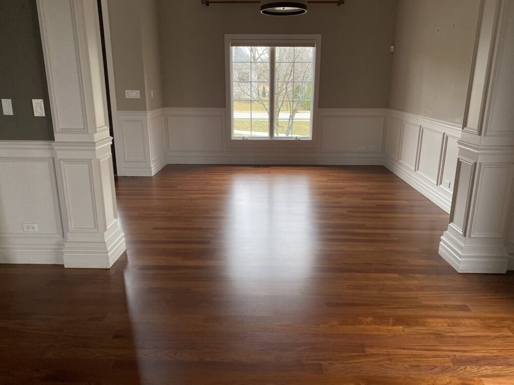 Brazilian cherry floor in the great room with wainscoting and columns, Barrington, IL