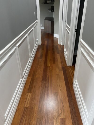 Brazilian cherry floor down the hallway with wainscoting, Barrington, IL