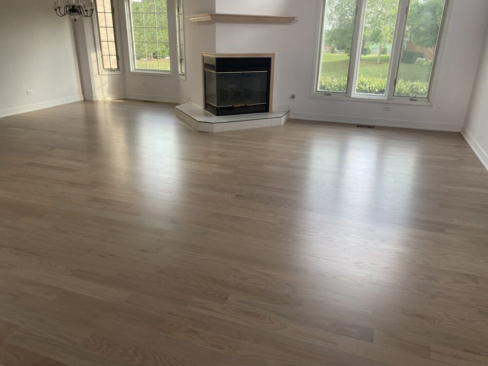 Silvered gray floor in the living room with corner fireplace, Barrington, IL