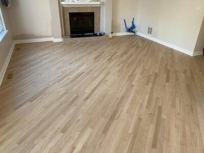 Natural hardwood floor in the living room with fireplace, Bartlett, IL