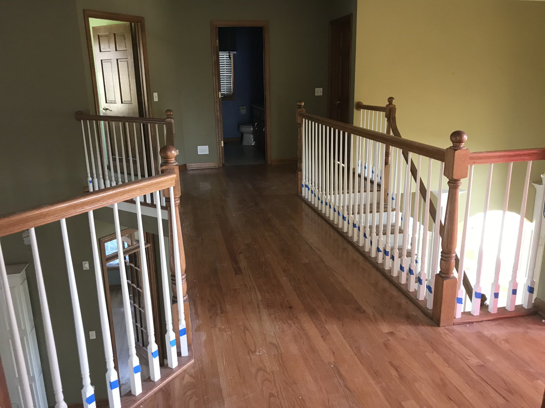 Staircase with the original light finish before refinishing, Batavia, IL