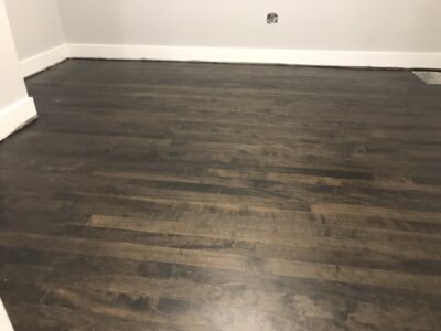 Ebony-stained hardwood grain, matte, Berwyn, IL
