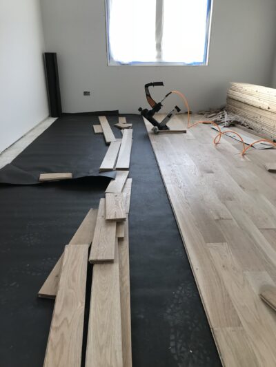 Installing new 5-inch white oak boards, Berwyn, IL (in-process)