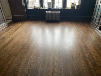 Refinished hardwood floor in a bright room, Bolingbrook, IL