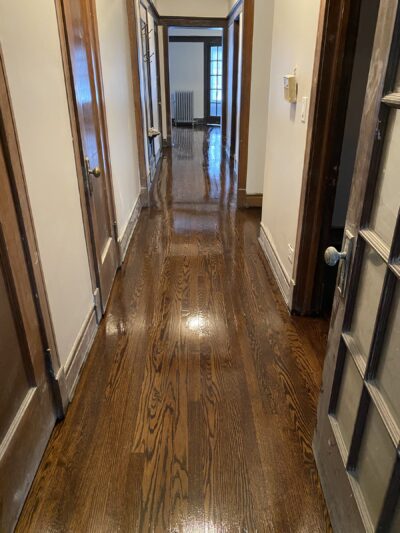 Refinished vintage hardwood floor down the hallway, Bolingbrook, IL