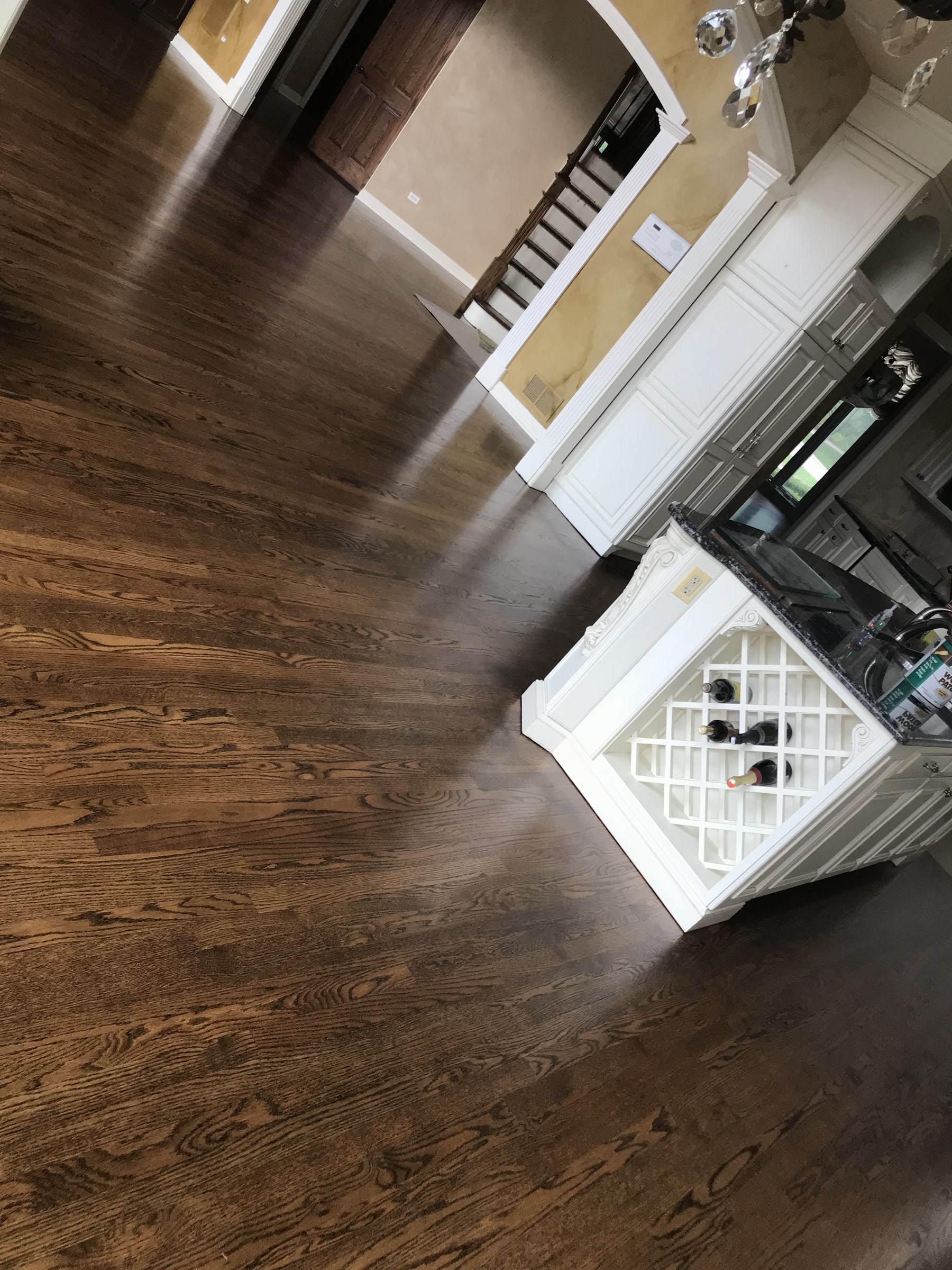 Kitchen floor stained Medium Brown around the island, Burr Ridge, IL