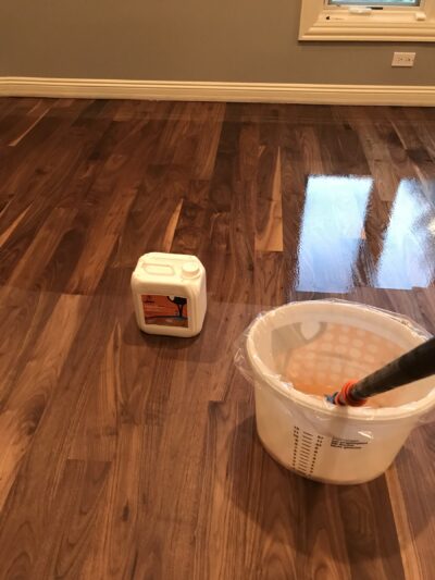 Applying the Loba finish coat to the Medium Brown floor, Burr Ridge, IL (in-process)