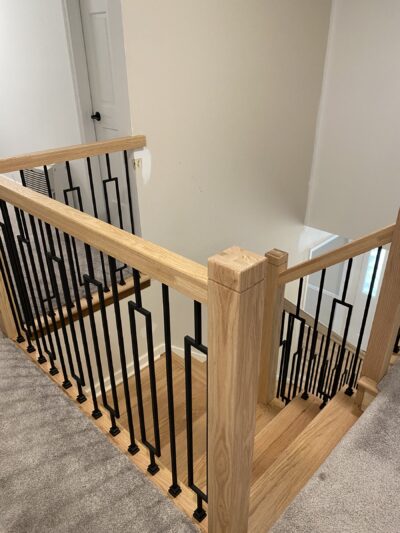 White oak stair landing with black iron balusters, Burr Ridge, IL