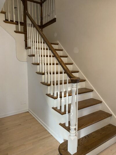 White oak staircase with white risers and a wood handrail, Burr Ridge, IL