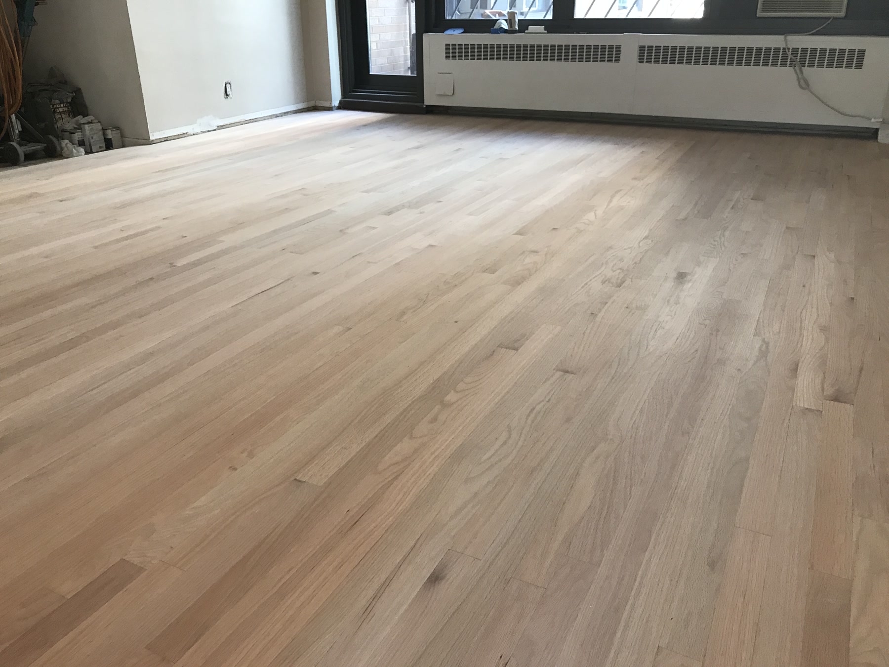 Hardwood floor sanded to bare wood before Bona White staining, Chicago, IL (in-process)