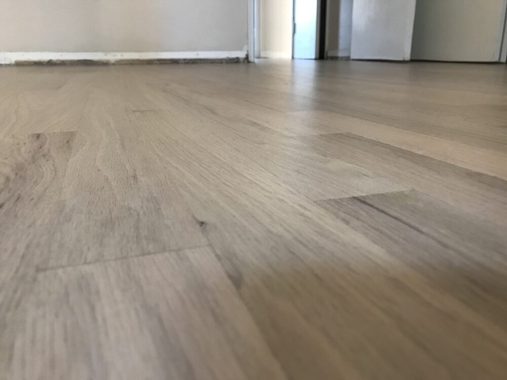 Refinished hardwood floor in the bright room, Chicago, IL