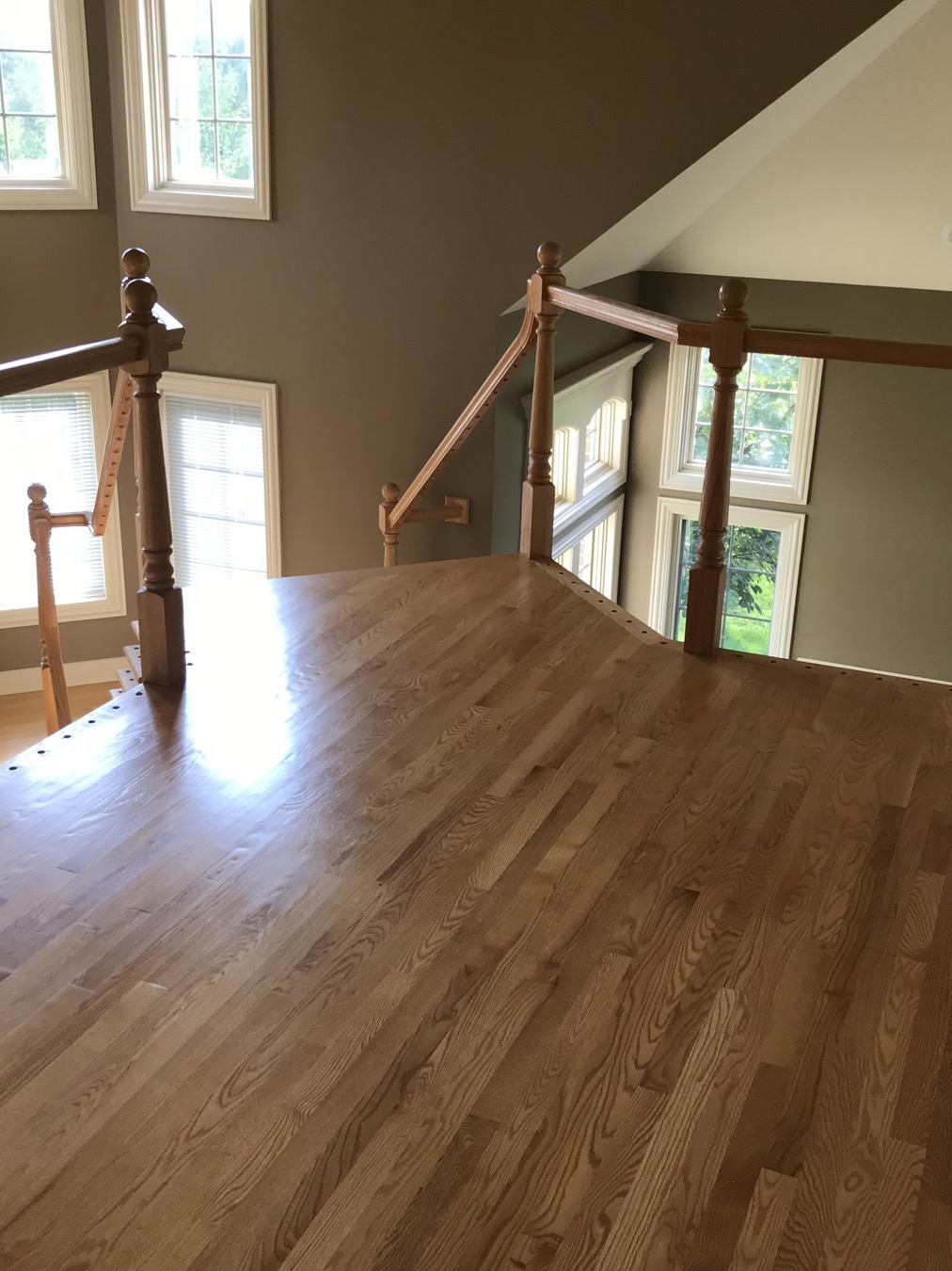 Rosewood stained hardwood floor in a Deerfield room