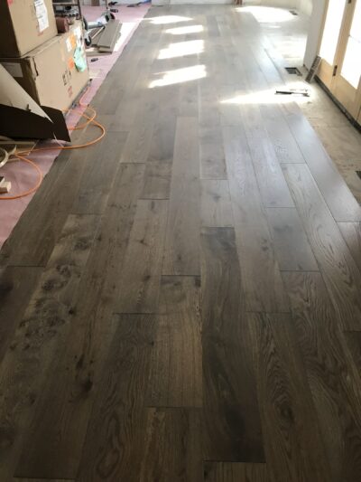 Wide-plank hardwood floor with a weathered tone, Downers Grove, IL