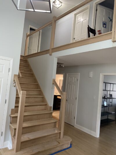 White-wash hardwood staircase from the landing, Highland Park, IL