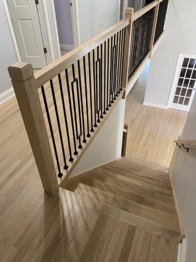 White-wash staircase and railing from the side, Highland Park, IL