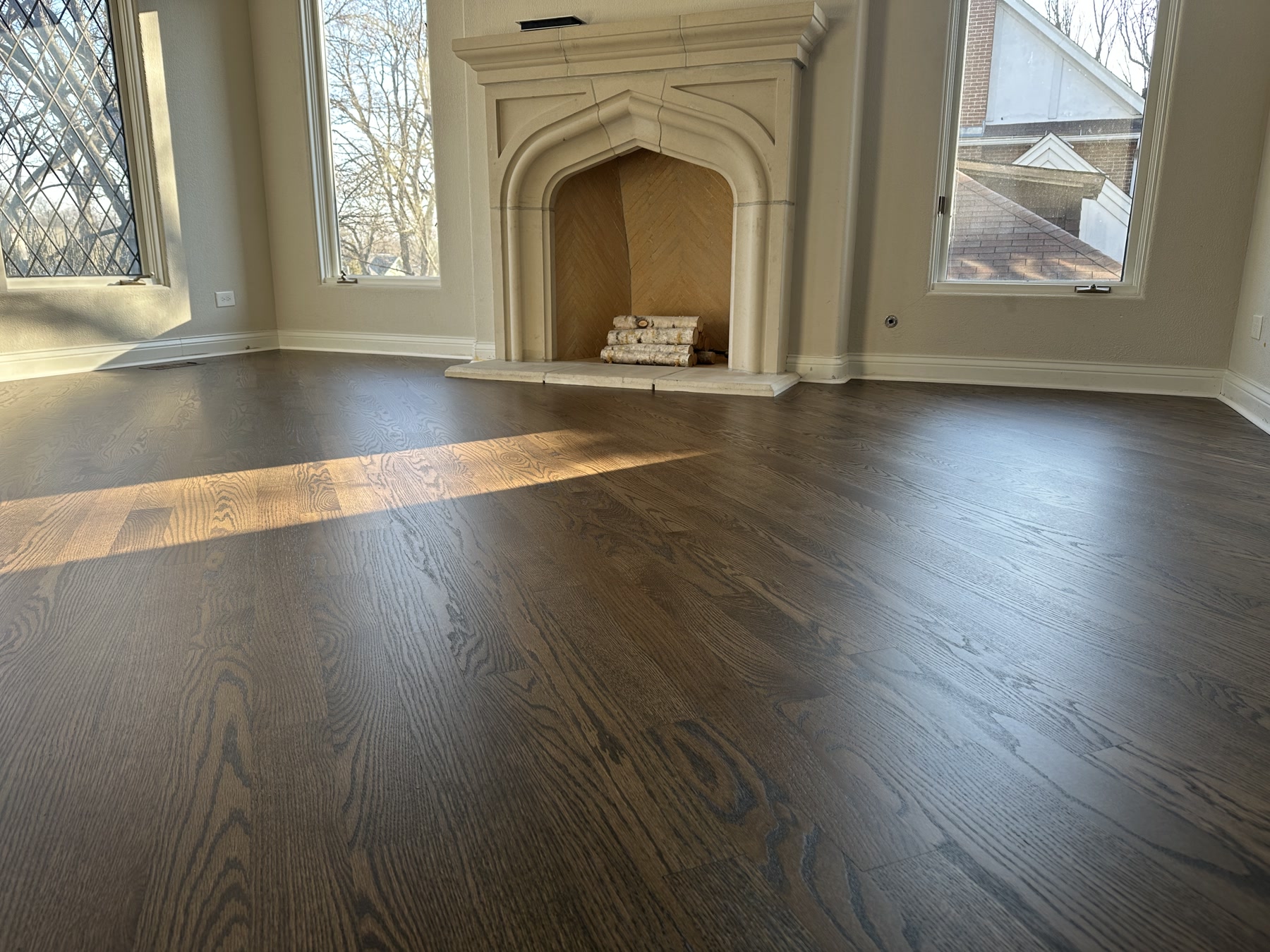 Diagonal Jacobean red oak floor in the same fireplace room after installation, Hinsdale, IL