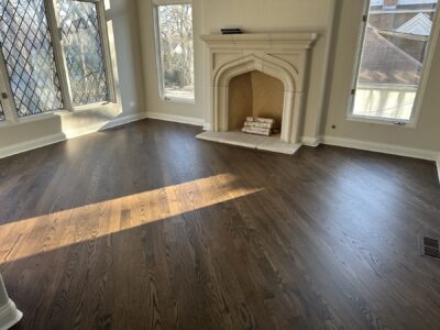 Diagonal Jacobean red oak floor by the fireplace in sunlight, Hinsdale, IL