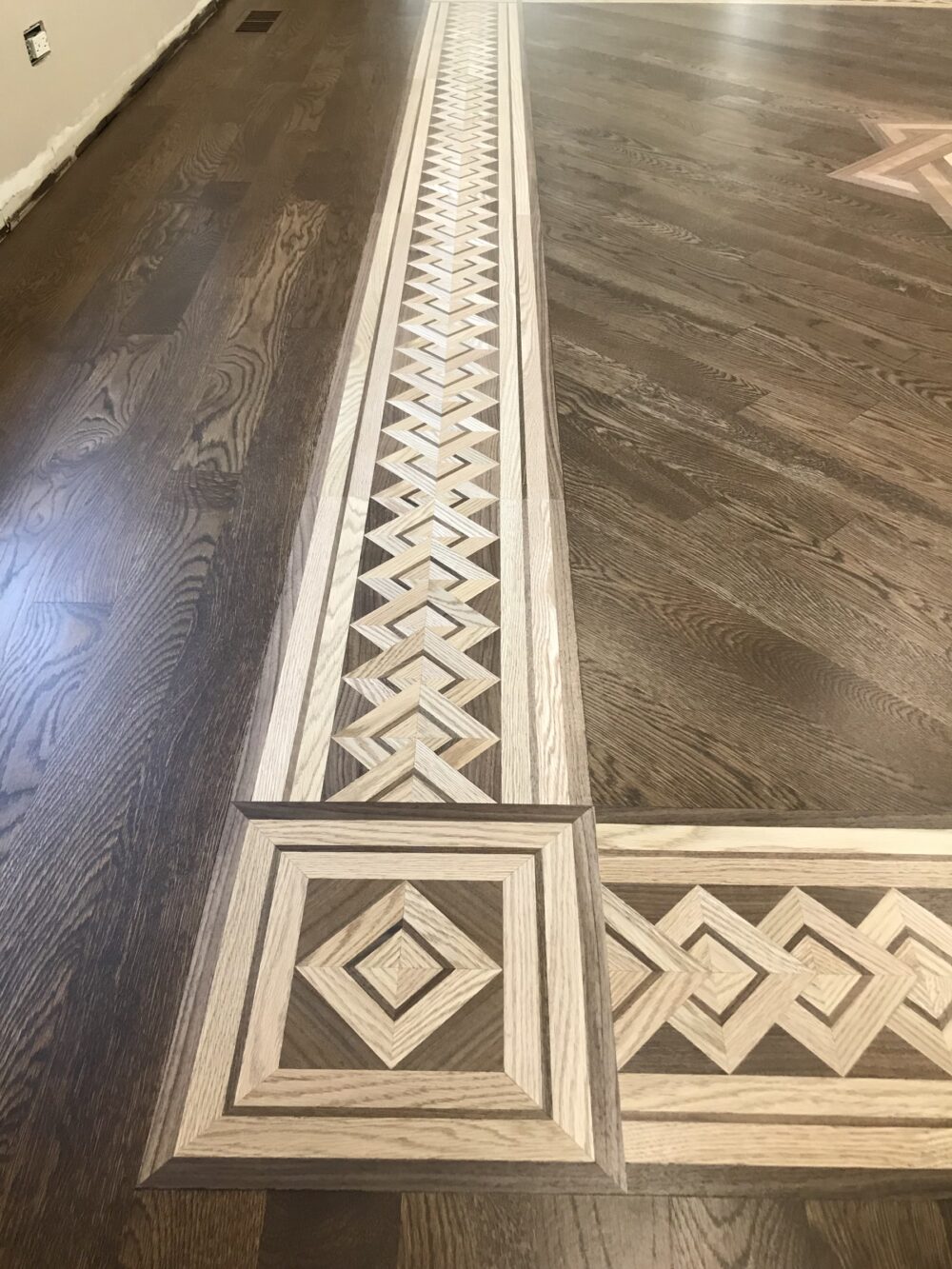 Marquetry hardwood floor with medallion and border in the room, Lemont, IL