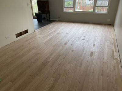 Newly installed raw red oak boards before staining, Naperville, IL