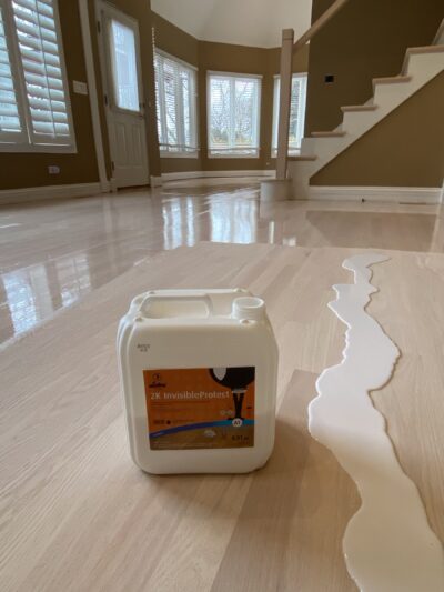 Loba finish being applied to the light oak floor, Naperville, IL (in-process)