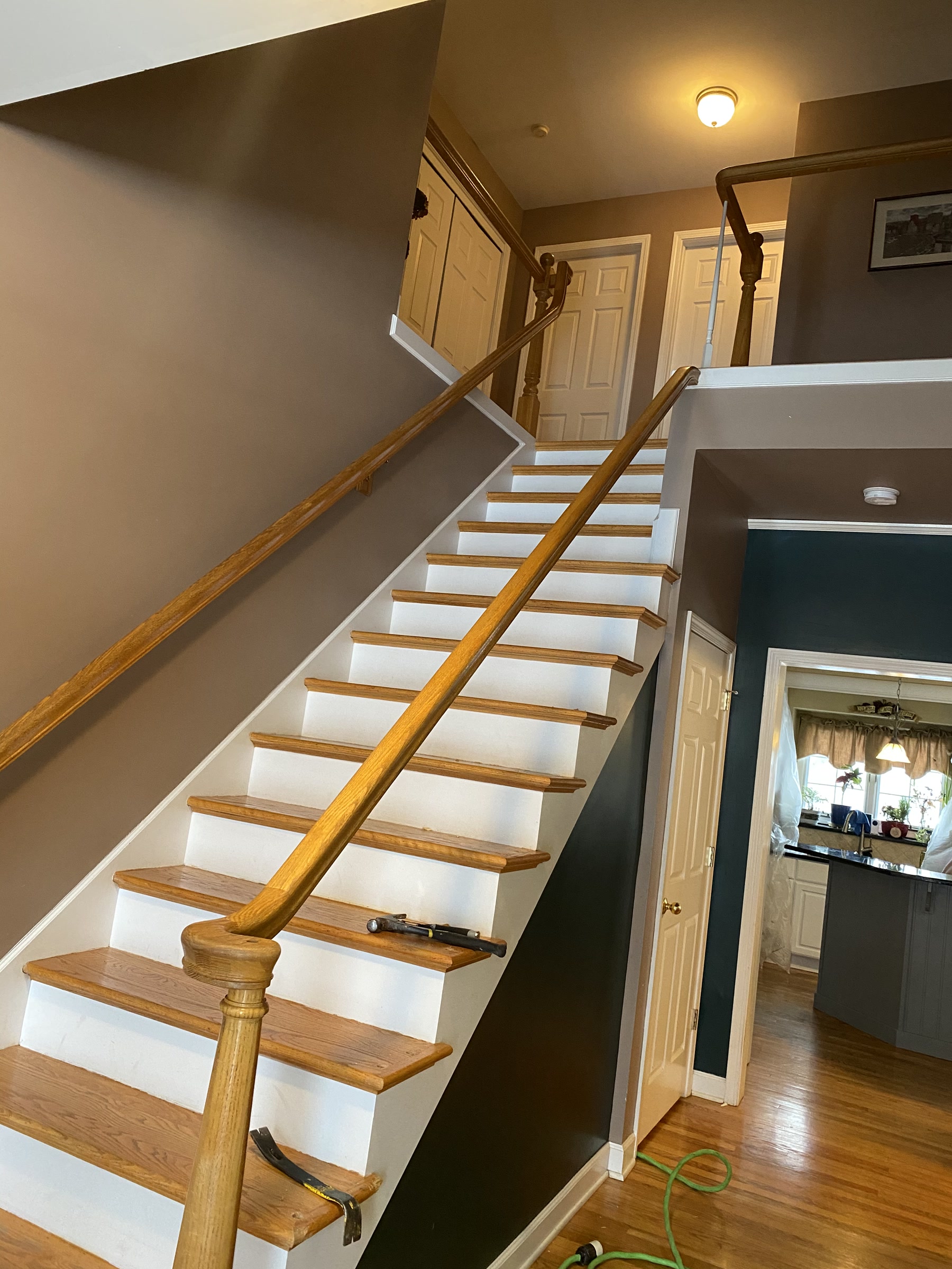 Refinished oak staircase with white risers, Naperville, IL