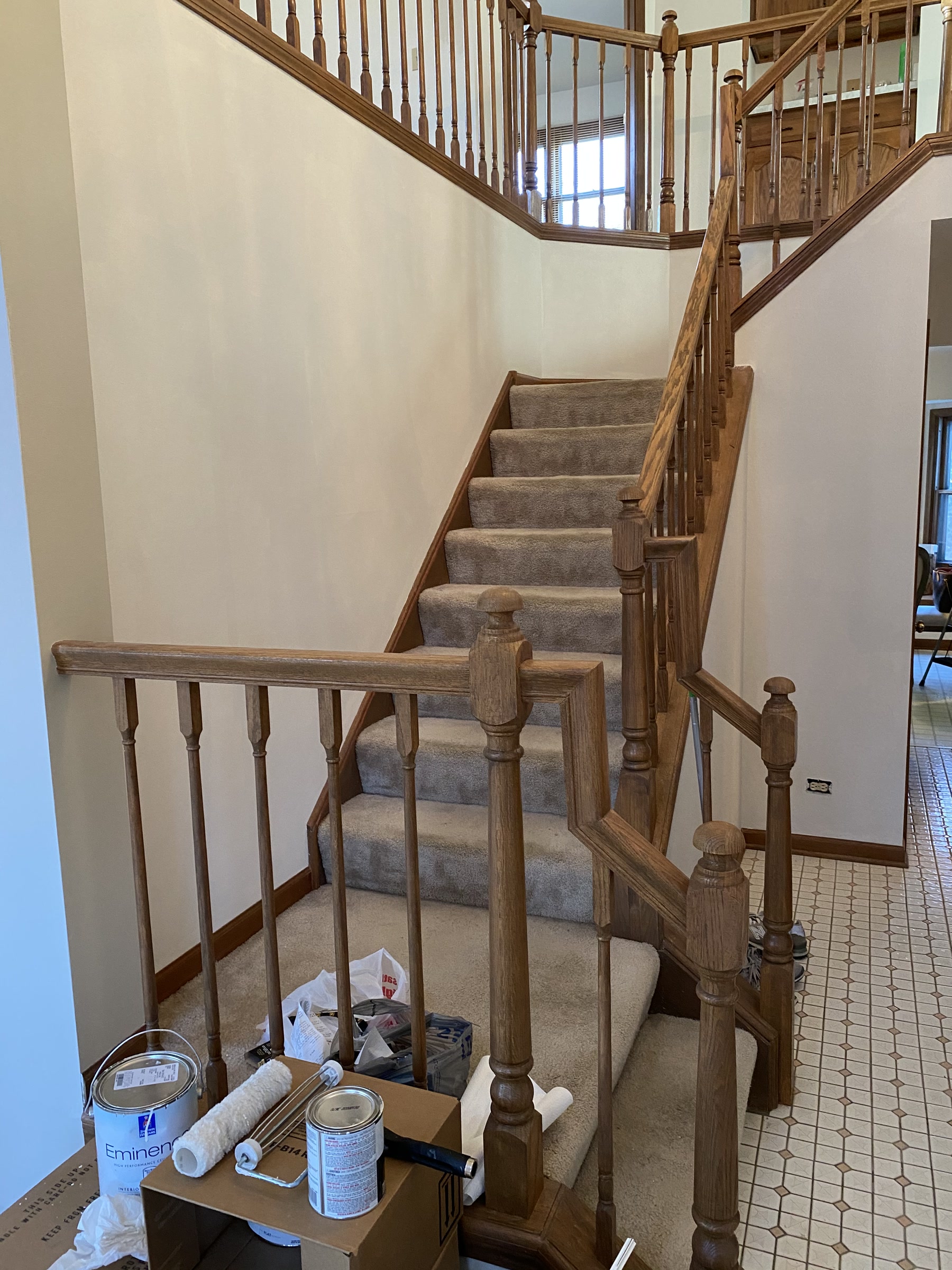 Carpeted staircase before refinishing in Naperville, IL