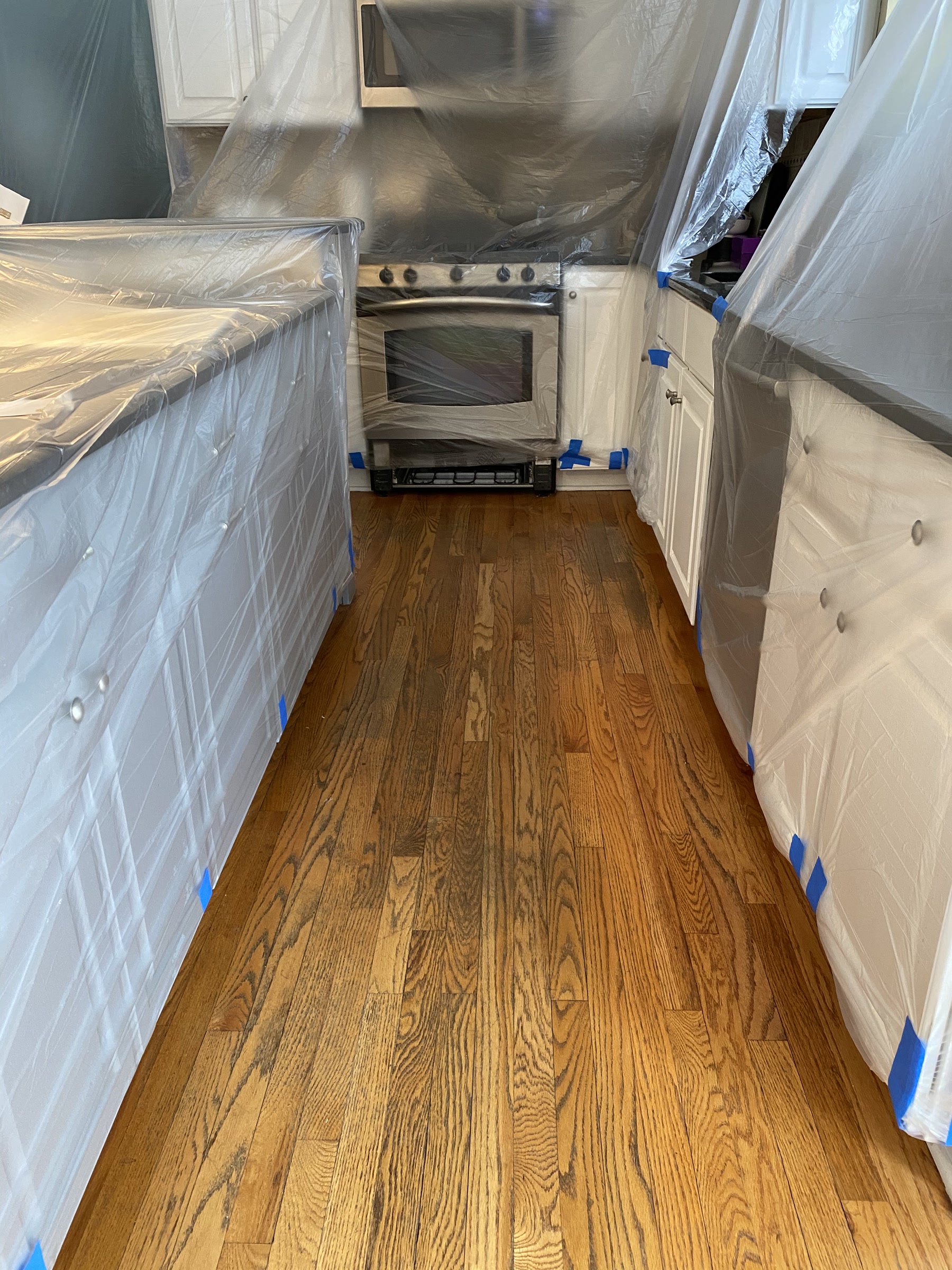 Kitchen floor sanded and masked before Jacobean staining, Northbrook, IL (in-process)