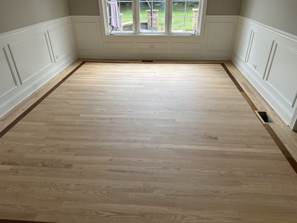 Natural floor with a dark border inlay, Orland Park, IL