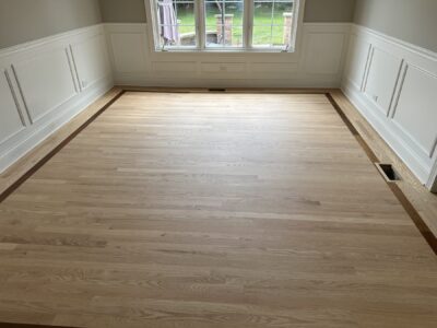 Natural floor with a dark border inlay, Orland Park, IL