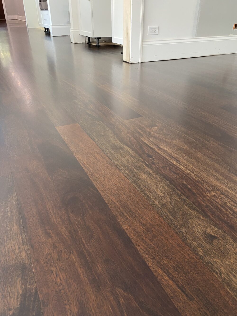 Ebony Brazilian cherry floor open to the dining area, Oswego, IL
