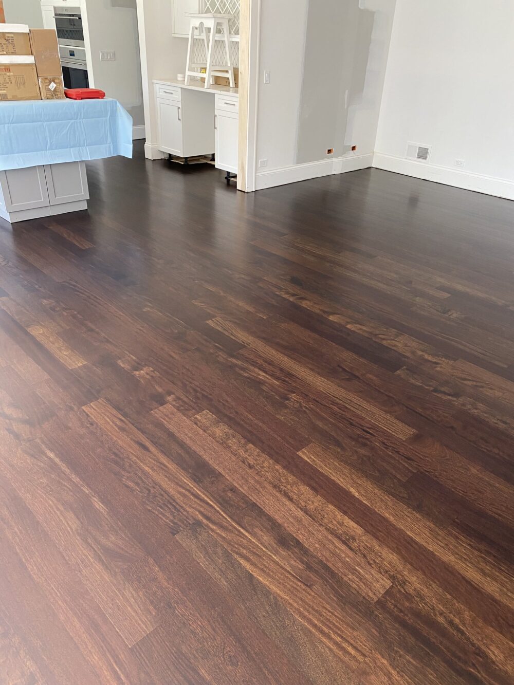 Ebony Brazilian cherry floor in the open kitchen, Oswego, IL