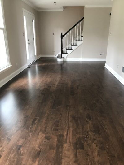 Espresso floor and staircase in the open room, Plainfield, IL