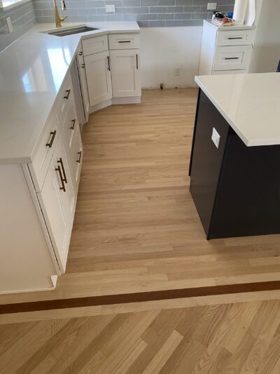Natural hardwood floor around the kitchen island, West Chicago, IL