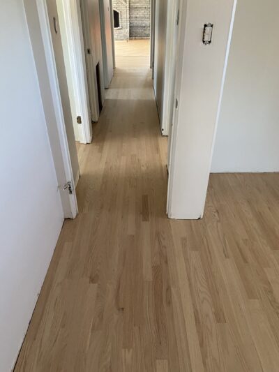 Natural hardwood floor down the hallway, West Chicago, IL