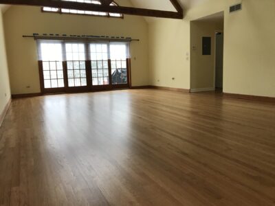 Golden Oak floor across the beamed great room, Western Springs, IL